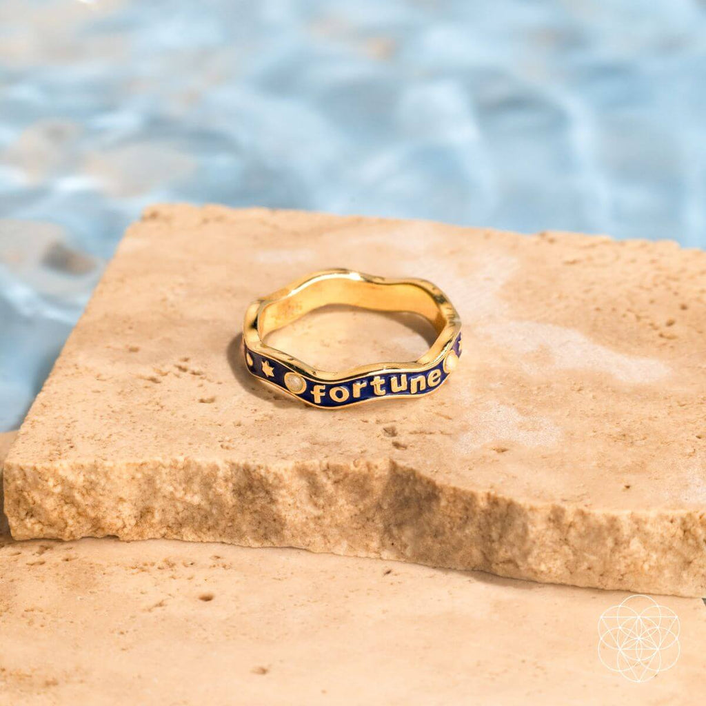 Fortune Magnet - Aquamarine Ring of Prosperity - Pileggi on the Square Salon Powered by Gatto Salon Group