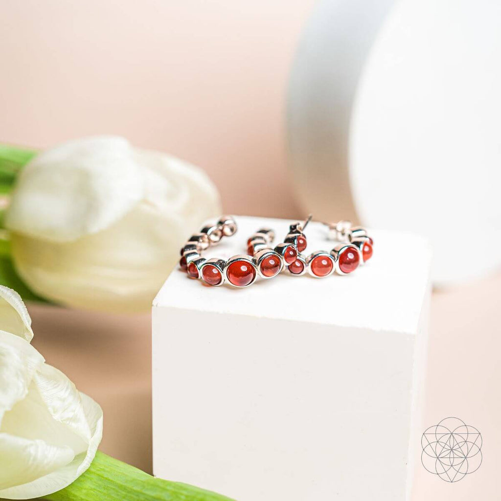 Rising Phoenix: Carnelian Earrings of Ambition - Pileggi on the Square Salon Powered by Gatto Salon Group