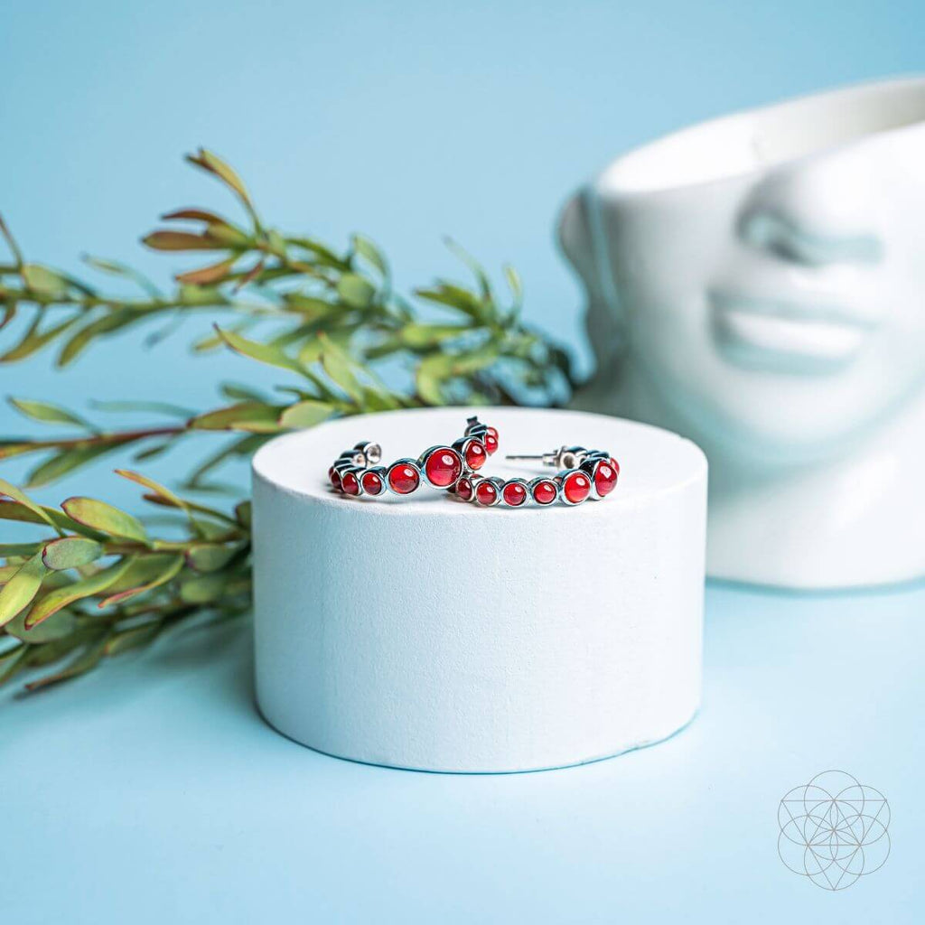 Rising Phoenix: Carnelian Earrings of Ambition - Pileggi on the Square Salon Powered by Gatto Salon Group