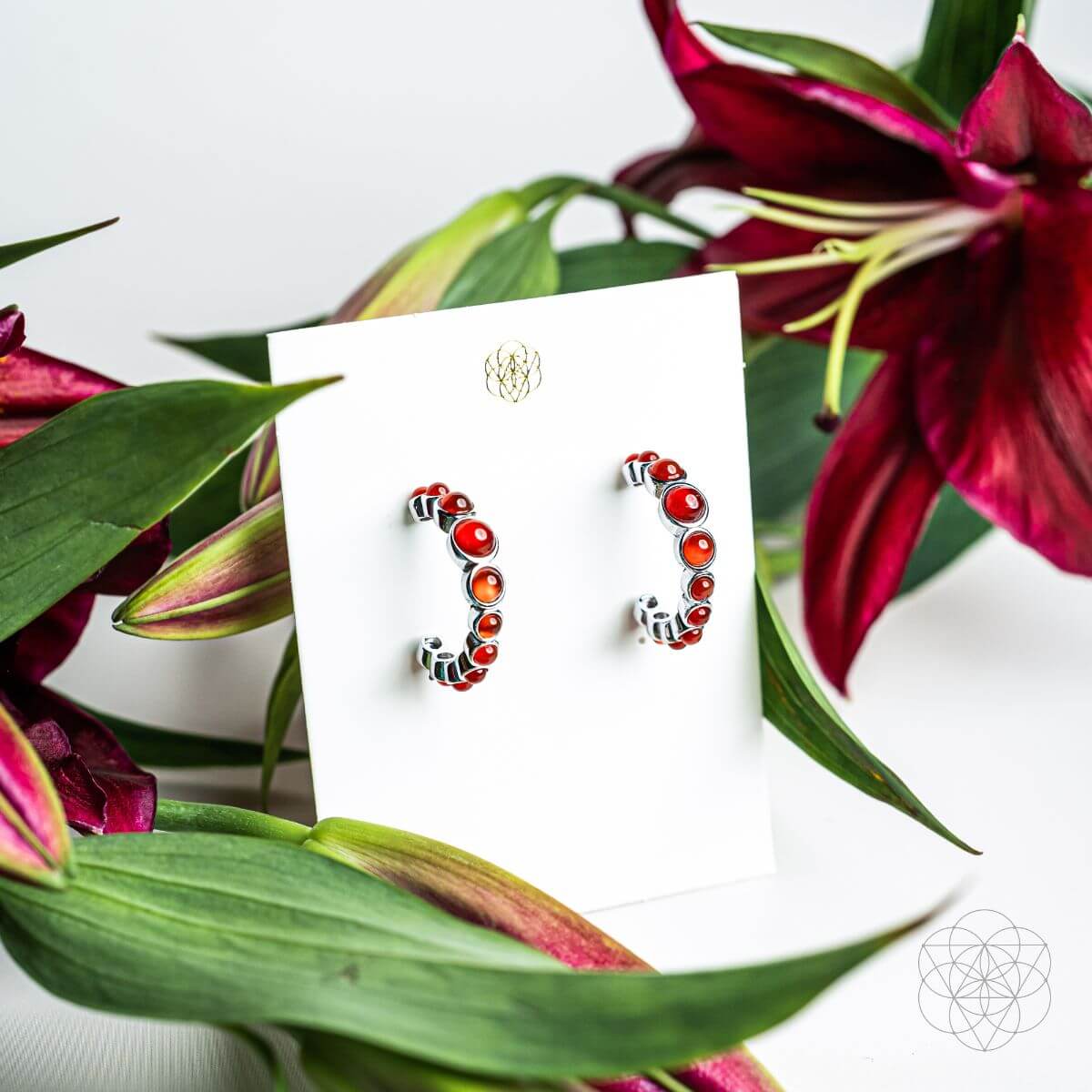 Rising Phoenix: Carnelian Earrings of Ambition - Pileggi on the Square Salon Powered by Gatto Salon Group