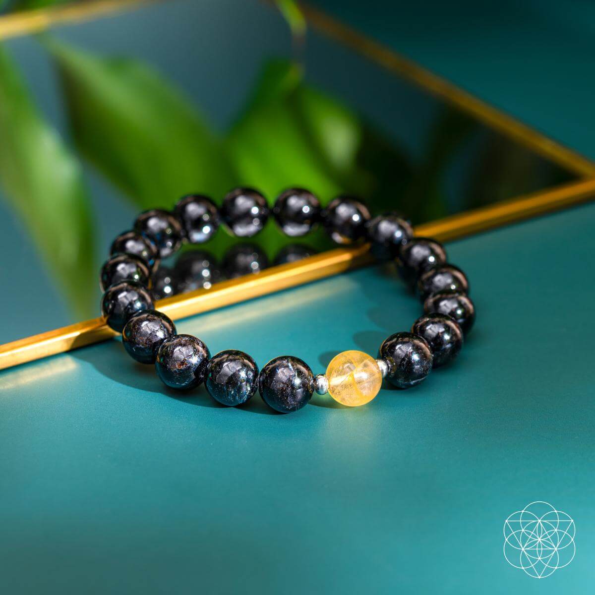 The Arfvedsonite Deep Healing Bracelet - Pileggi on the Square Salon Powered by Gatto Salon Group