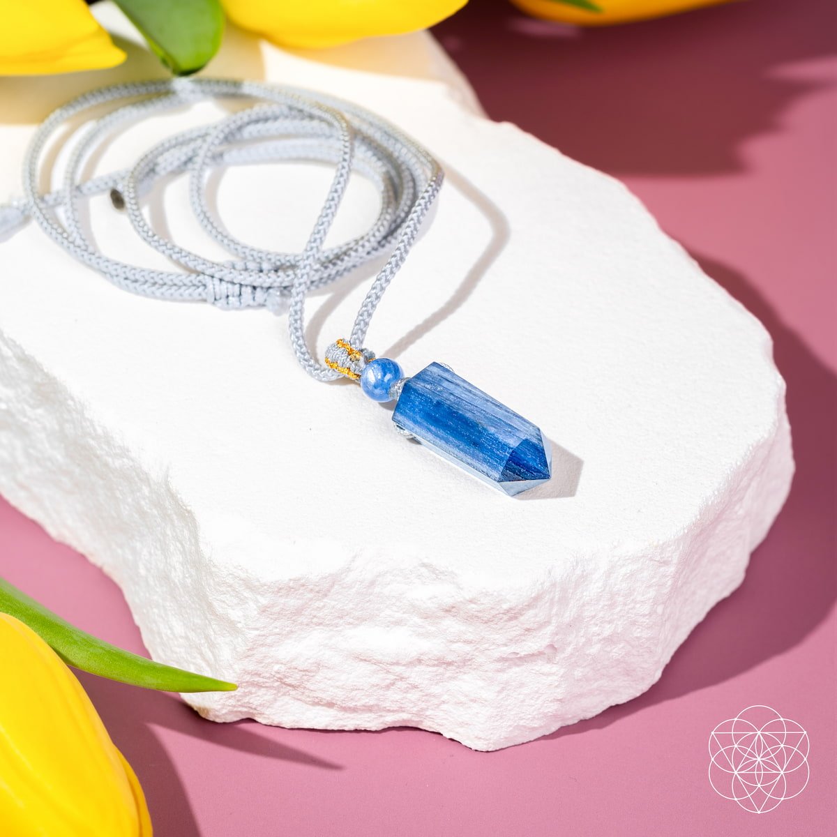 The Aura Shield - Rare Kyanite Pendant - Pileggi on the Square Salon Powered by Gatto Salon Group