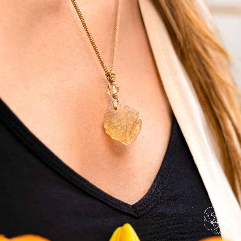 The Destiny Relic – Libyan Desert Glass Pendant - Pileggi on the Square Salon Powered by Gatto Salon Group