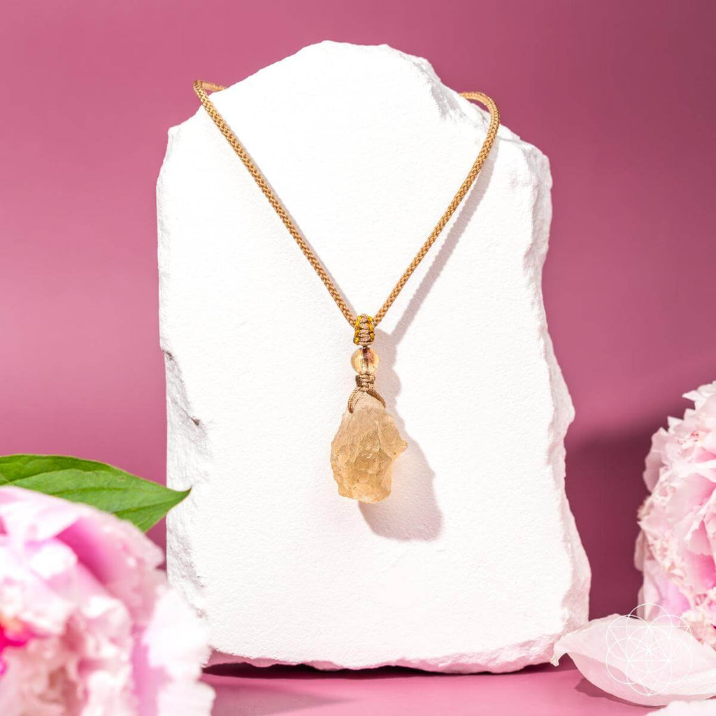 The Destiny Relic – Libyan Desert Glass Pendant - Pileggi on the Square Salon Powered by Gatto Salon Group