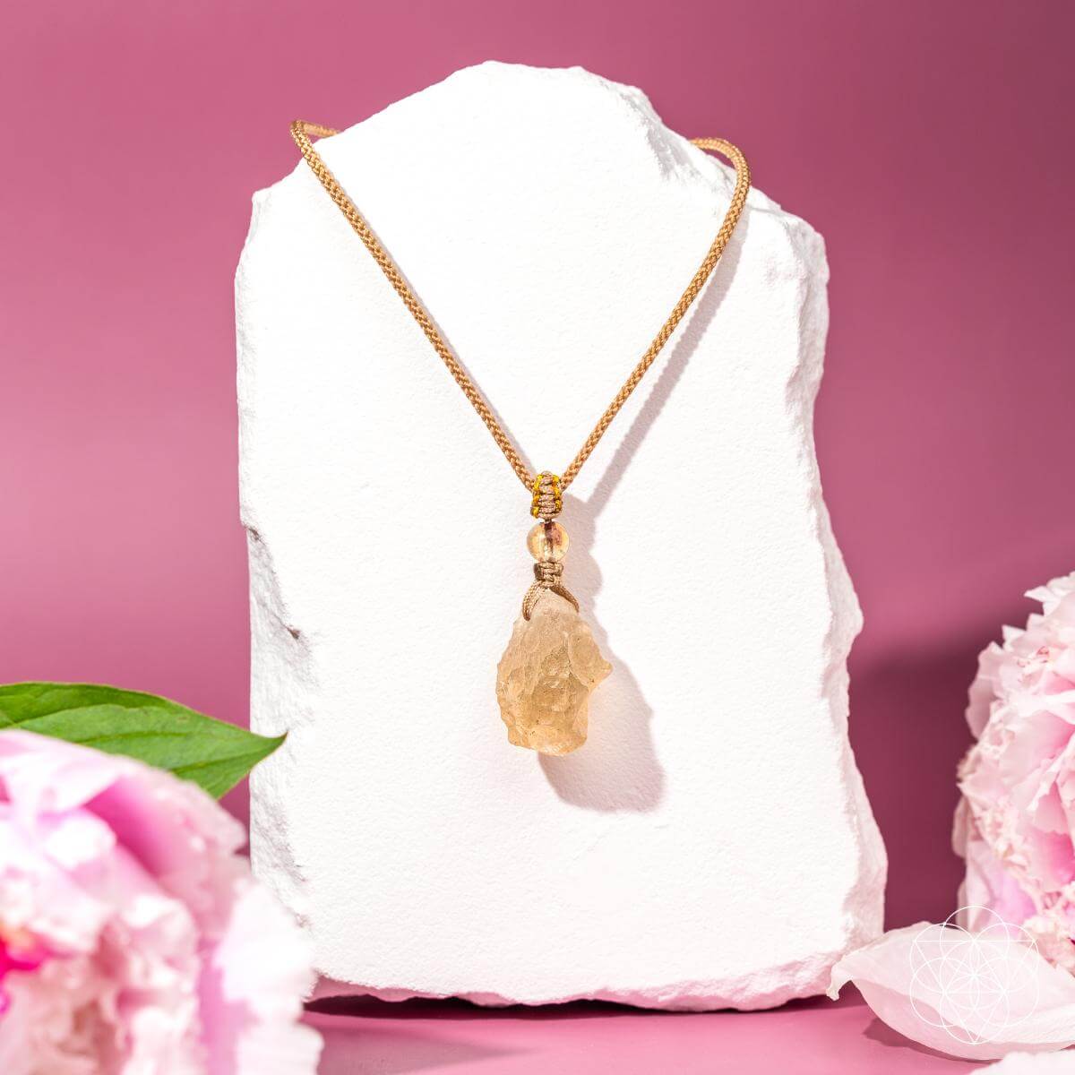 The Destiny Relic – Libyan Desert Glass Pendant - Pileggi on the Square Salon Powered by Gatto Salon Group