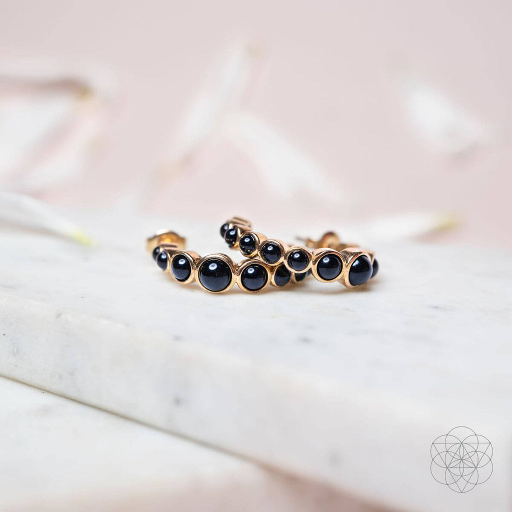Wisdom & Willpower - Onyx Earrings of Resilience - Pileggi on the Square Salon Powered by Gatto Salon Group